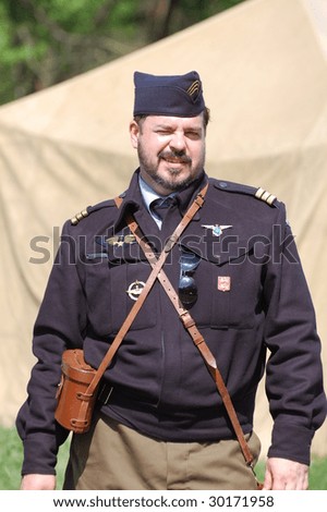 KIEV, UKRAINE - MAY 9: A member of history club called Red Star wears historical French Air Force uniform as he participates in a WWII reenactment May 9, 2009 in Kiev, Ukraine.