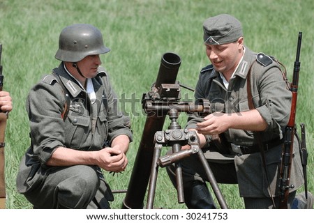 KIEV, UKRAINE - MAY 9: Members of a military history club wears a historical German uniform as he participates in a WWII reenactment May 9, 2009 in Kiev, Ukraine.