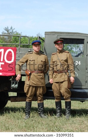 KIEV - MAY 9: Members of history club called Red Star wear historical Soviet uniform as they participate in a WWII reenactment May 9, 2009 in Kiev, Ukraine.