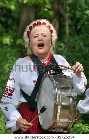 KIEV, UKRAINE - JUNE 6: Singer wearing historical costume .  Annual festival traditional Ukrainian music. Kiev,Ukraine. June 6, 2009