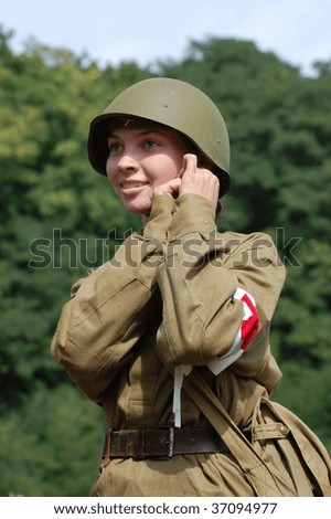KIEV, UKRAINE - SEPTEMBER 6 : A member of a history club in historical German uniform participates in 1941 WWII reenactment September 6, 2009 in Kiev, Ukraine.