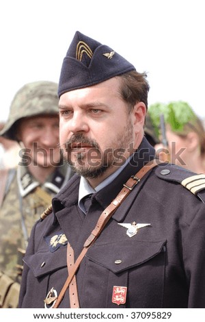 KIEV, UKRAINE - SEPTEMBER 6 : A member of Red Star history club in historical French Air Force uniform participates in 1941 WWII reenactment September 6, 2009 in Kiev, Ukraine.