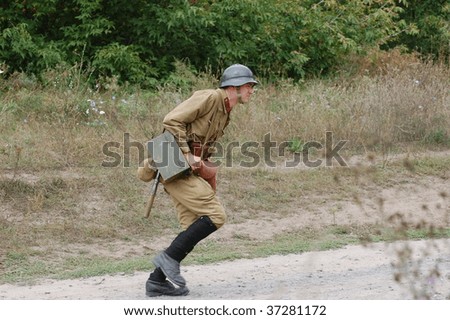 KIEV, UKRAINE - SEPT 6, : Member of a history club wear historical Soviet uniforms as he participates in a WWII reenactment.Defense Kiev in 1941. September 6 , 2009 in Kiev, Ukraine