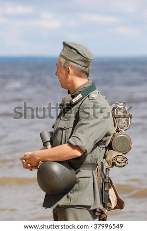 KIEV, UKRAINE - SEPT 19, : Member of a history club wear historical German uniforms as he participates in a WWII reenactment.Battle for Kiev in 1943. September 19 , 2009 in Kiev, Ukraine