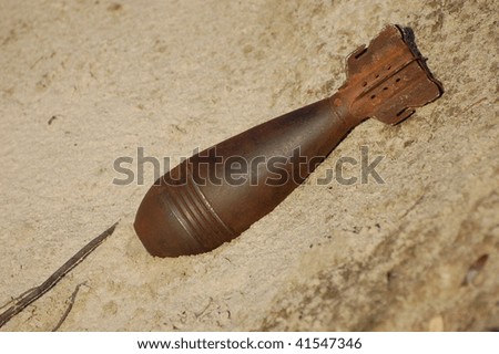 Old rusted World War II mortar shell