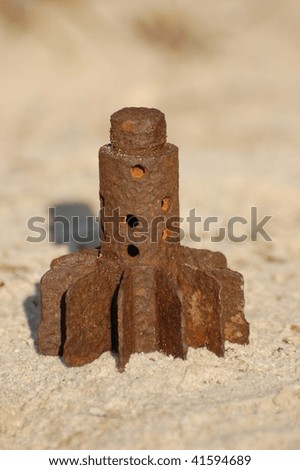 Old rusted World War II part of mortar shell
