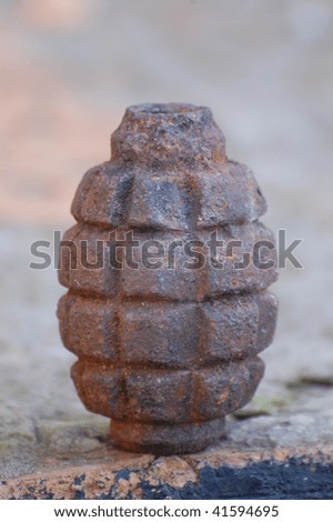 Old rusted World War II grenade