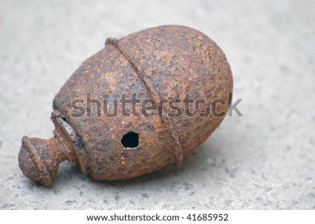 Old rusted German World War II hand grenade