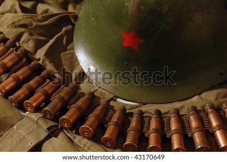 Old rusted World War II munition.Soviet cartridges in machine gun ribbon