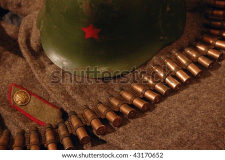 Old rusted World War II munition.Soviet cartridges in machine gun ribbon