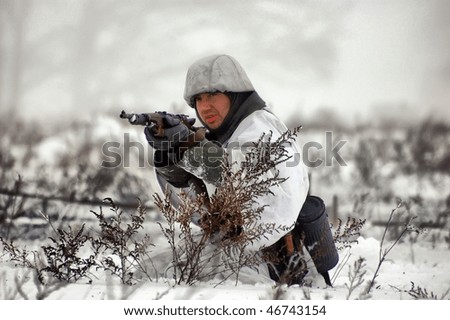 KIEV, UKRAINE - FEB 14: Member of a history club wear historical German uniforms during a WWII reenactment of  \'Defense Kiev\' in 1943. The event took place on February 14, 2010 in Kiev, Ukraine.