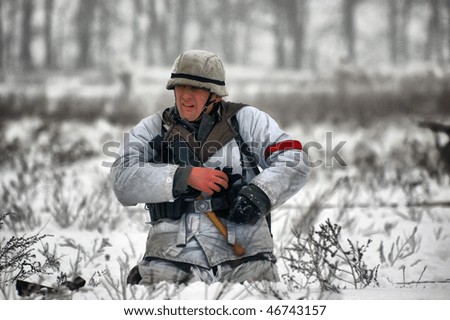 KIEV, UKRAINE - FEB 14: Member of a history club wear historical German uniforms during a WWII reenactment of  \'Defense Kiev\' in 1943. The event took place on February 14, 2010 in Kiev, Ukraine.