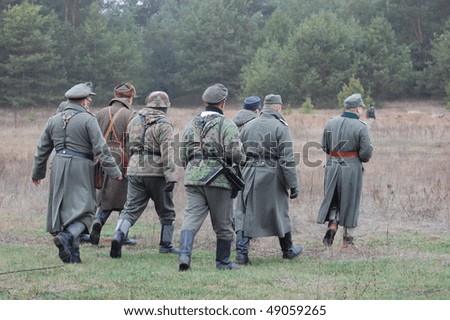 KIEV, UKRAINE - DEC 6: Members of a history club Red Star wear historical German uniforms during a WWII reenactment \'Defense Kiev\' in 1943 December 6, 2009 in Kiev, Ukraine