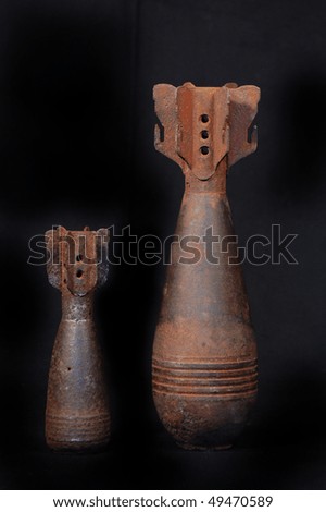 Old rusted World War II mortar shells 50 and 82 mm