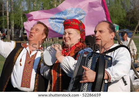 KIEV, UKRAINE - MAY 2: Ukraine annual folk culture festival. Folk singers wear historical Ukrainian costume May, 2010 in Kiev, Ukraine