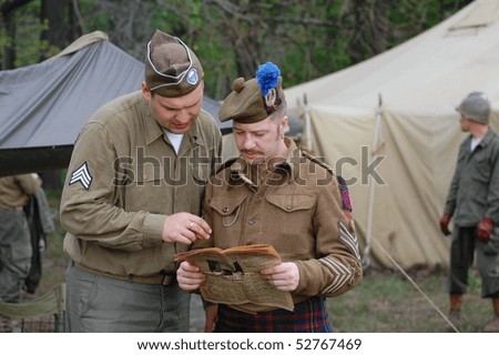 KIEV, UKRAINE - MAY 10 :  members of Red Star history club wears historical British&US uniforms during participation in 1945 WWII reenactment May 10, 2010 in Kiev, Ukraine.