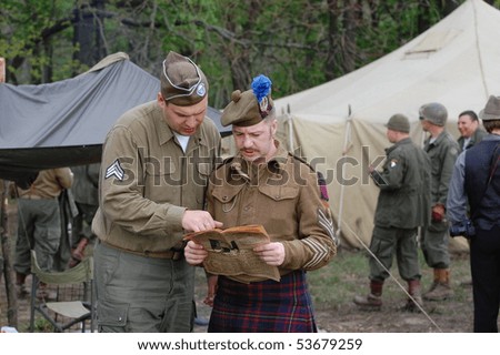 KIEV, UKRAINE - MAY 10 : members of Red Star history club wears historical British&US uniforms during participation in 1945 WWII reenactment May 10, 2010 in Kiev, Ukraine