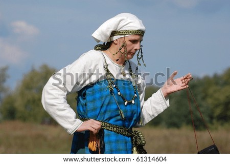 KIEV, UKRAINE - SEPT 19: Participant of Festivale of medieval costume wears historical costume Sep 19, 2010 in Kiev, Ukraine
