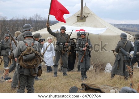 KIEV, UKRAINE - NOV 7: members of Red Star history club wear historical German uniform during historical reenactment of Kiev Liberation in 1943, November 7, 2010 in Kiev, Ukraine