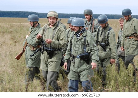 CHERNIGOW, UKRAINE - AUG 29: Members of Red Star military history club wear historical German uniform during historical reenactment of WWII, August 29, 2010 in Chernigow, Ukraine
