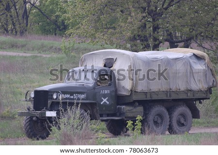 KIEV, UKRAINE - MAY 8 :An unidentified member of Red Star history club drives a WW2 Soviet truck during historical reenactment of WWII on May 8, 2011 in Kiev, Ukraine