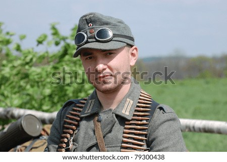 KIEV, UKRAINE - MAY 8 : Member of Red Star history club wears historical German uniform during historical reenactment of WWII on May 8, 2011 in Kiev, Ukraine