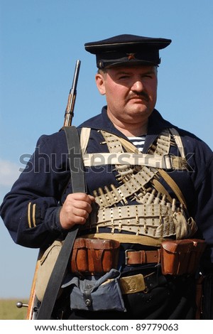 KIEV, UKRAINE -SEPT 18 : An unidentified member of Red Star history club wears historical Soviet uniform during historical reenactment of WWII, September 18, 2011 in Kiev, Ukraine