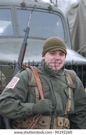 KIEV, UKRAINE -FEB 25: Unidentified member of Red Star history club wears historical American uniforms during historical reenactment of WWII, Military history club Red Star on February 25, 2012 in Kiev, Ukraine