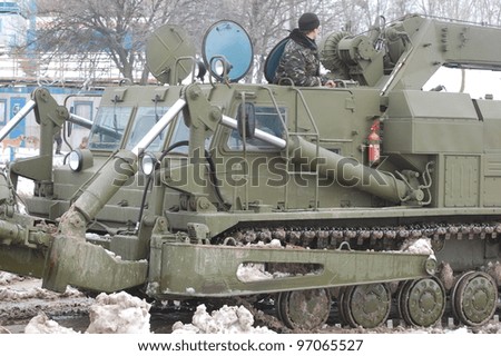 KIEV, UKRAINE -FEB 24:Heavy-duty Soviet military tractor in action during Historical Military Motor Show, February 24, 2012 in Kiev, Ukraine