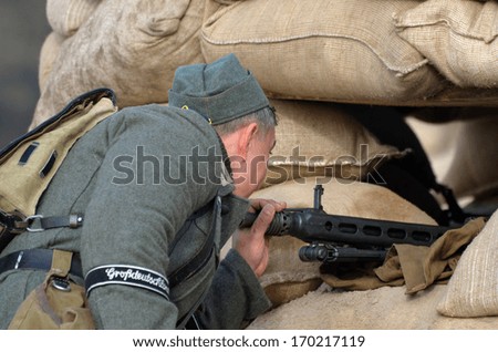 KIEV, UKRAINE -NOV 3: German MG-42 machine gun  (Red Star military history club)  during historical reenactment of WWII, Dnepr river crossing 1943, November 3, 2013 Kiev, Ukraine