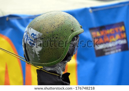 KIEV, UKRAINE - FEB 10, 2014: Downtown of Kiev.Doll wears police uniform and helmet of policeman EXECUTED in the camp of protesters. Riot in Kiev and Western Ukraine.February 10, 2014 Kiev, Ukraine