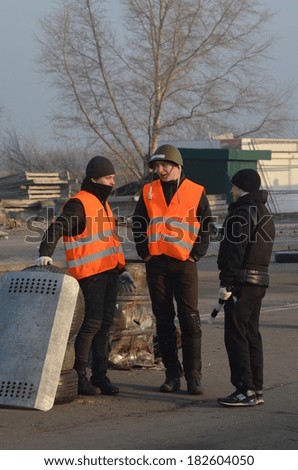 KIEV, UKRAINE - FEB 24, 2014: Traffic regulation point,created people Self defense of Kiev.Troeshina district . Riot in Kiev and Western Ukraine