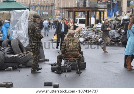 KIEV, UKRAINE - APR 19, 2014:People in the rioters camp in downtown.Main street of Kiev. Putsch of Junta in Kiev. Kiev.April 19, 2014 Kiev, Ukraine