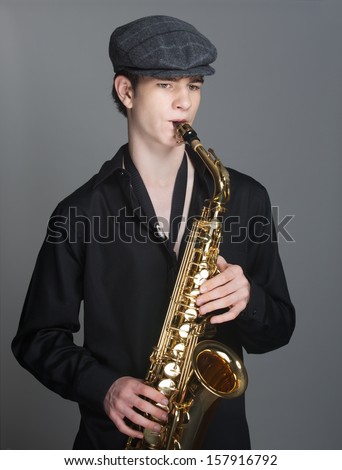 Young Saxophonist playing alto sax