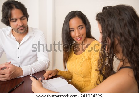 Two women talking at a business meeting