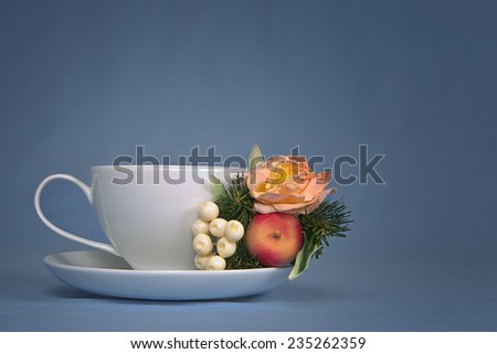 White Coffee Cup with Pink Rose, Apple and White Berries Christmas Bouquet