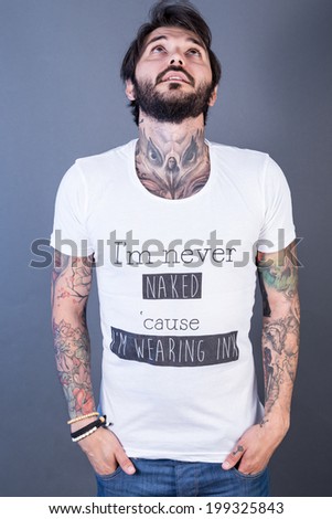 tattoo man with funny t-shirt