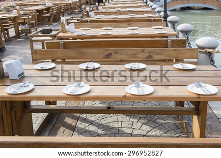 wood table and wood chair in restaurant