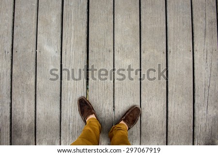 old wood floor with man foot