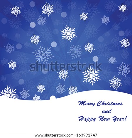 Blue Christmas background with rays and snowflakes