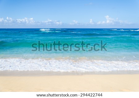 Ocean and tropical sandy beach background (Hawaii, Kauai)