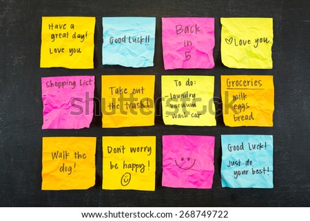 Crumpled hand written sticky note messages