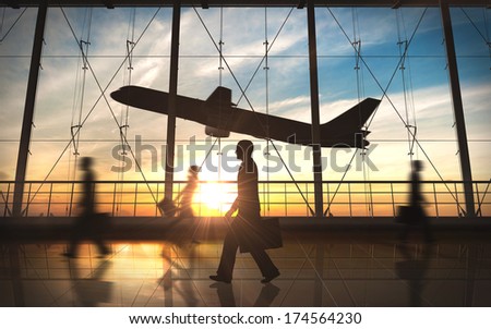 Business man walking silhouette in the airport