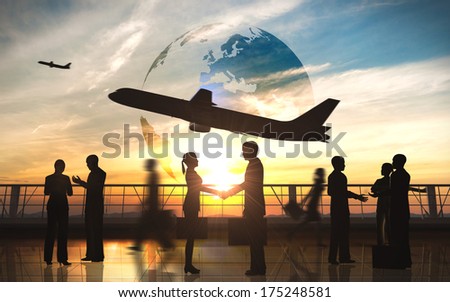 Global Team Business shake hand with airplane silhouettes