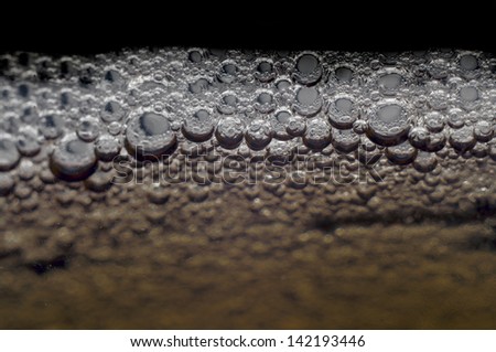 Carbonated drink foam closeup