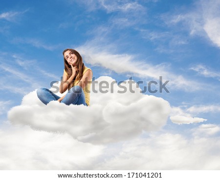 young pretty woman sitting on a cloud thinking