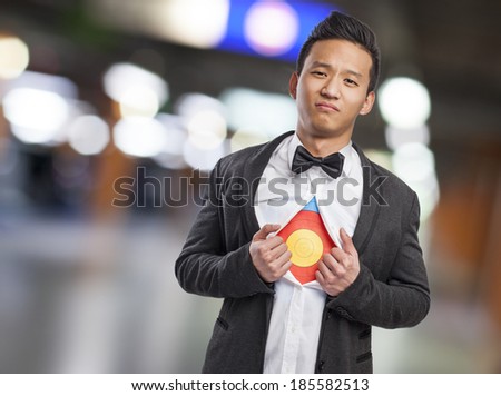 young asian business man with target in his chest