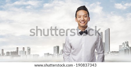 handsome young asian man wearing a shirt and bow