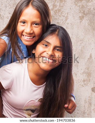 portrait of a cute sisters having fun