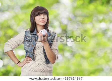 portrait of beautiful young woman thinking about her luck